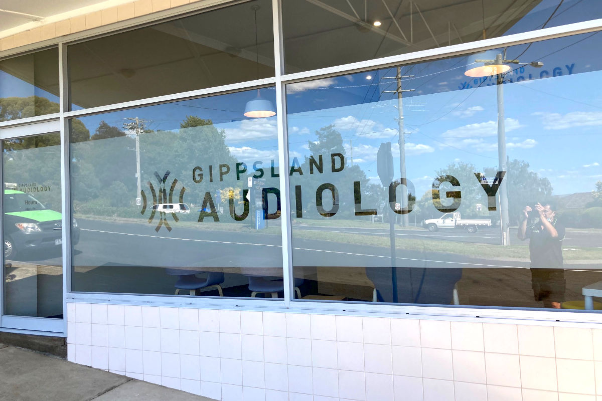 Frosted window sign for audiology business