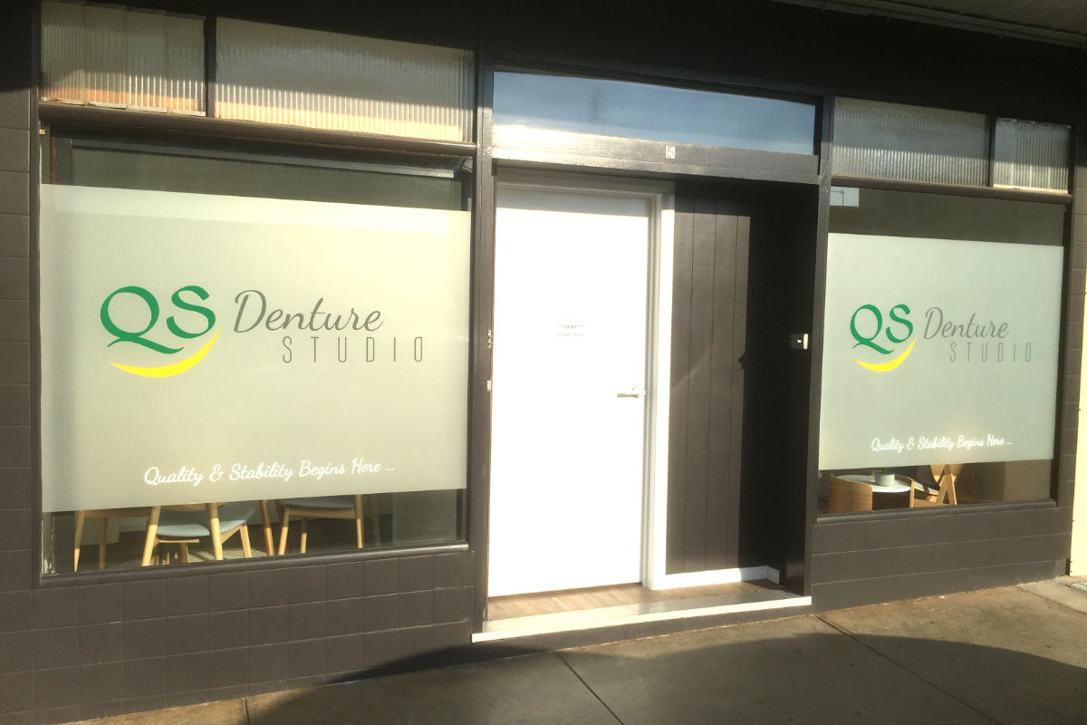 Frosted window signage for denture studio