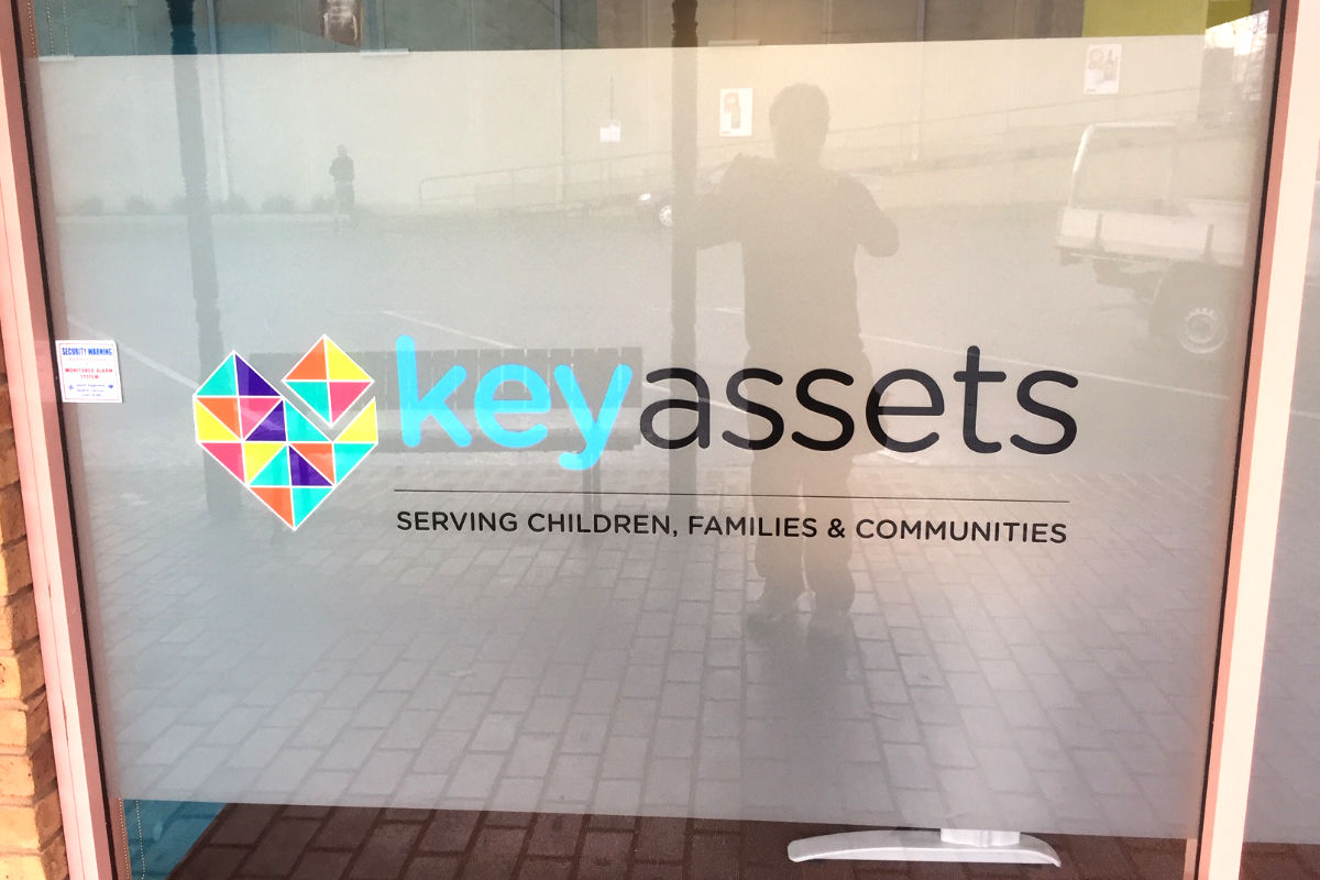 Frosted window signage for Key Assets children's services