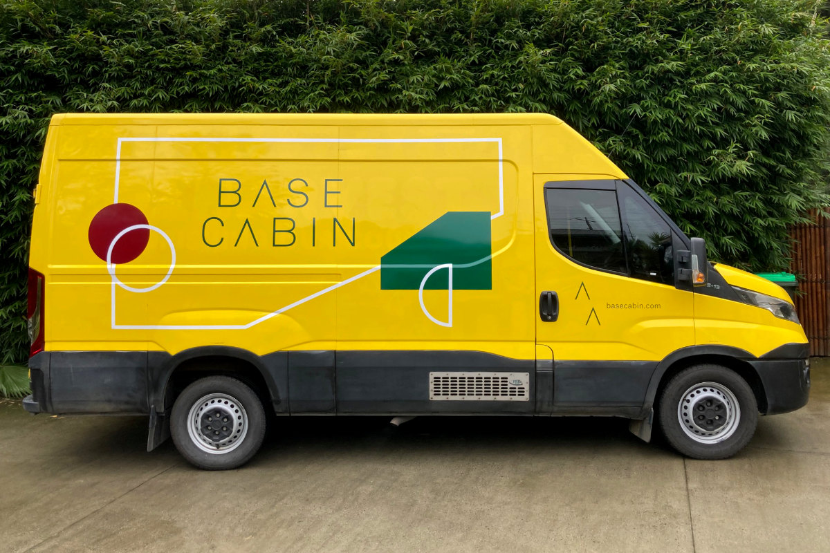 Base Cabin bright colourful van sign by Signspec