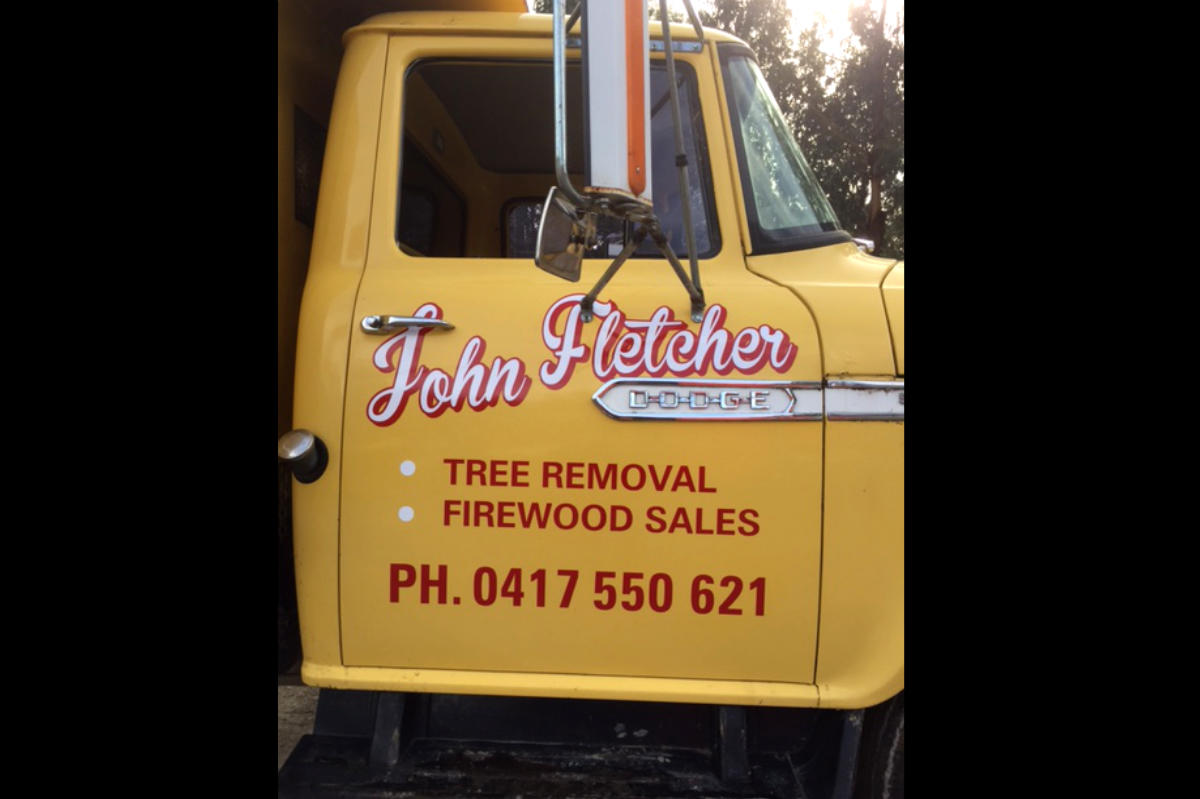 John Fletcher Tree Removal truck sign