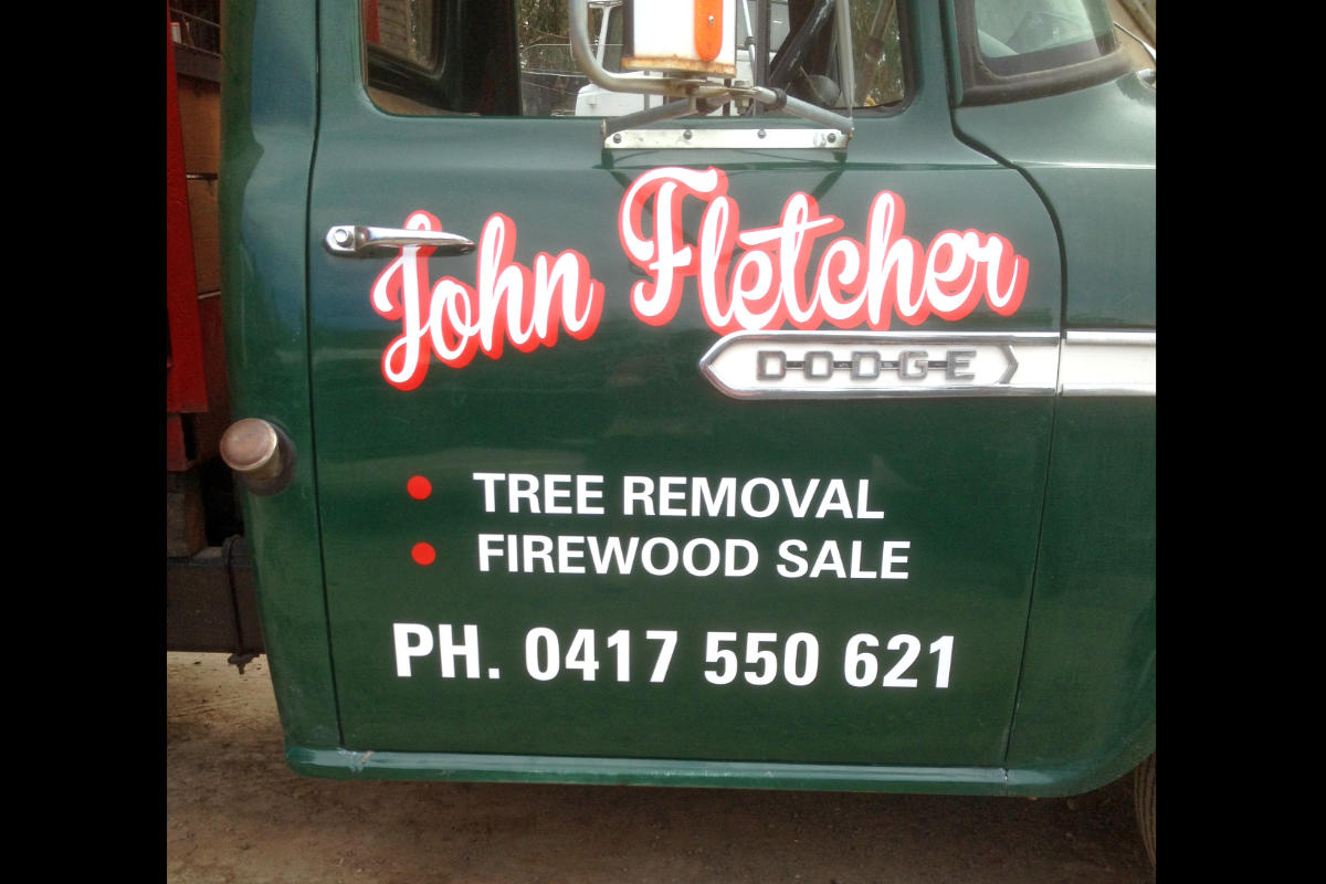 Vehicle sign for John Fletcher tree removal